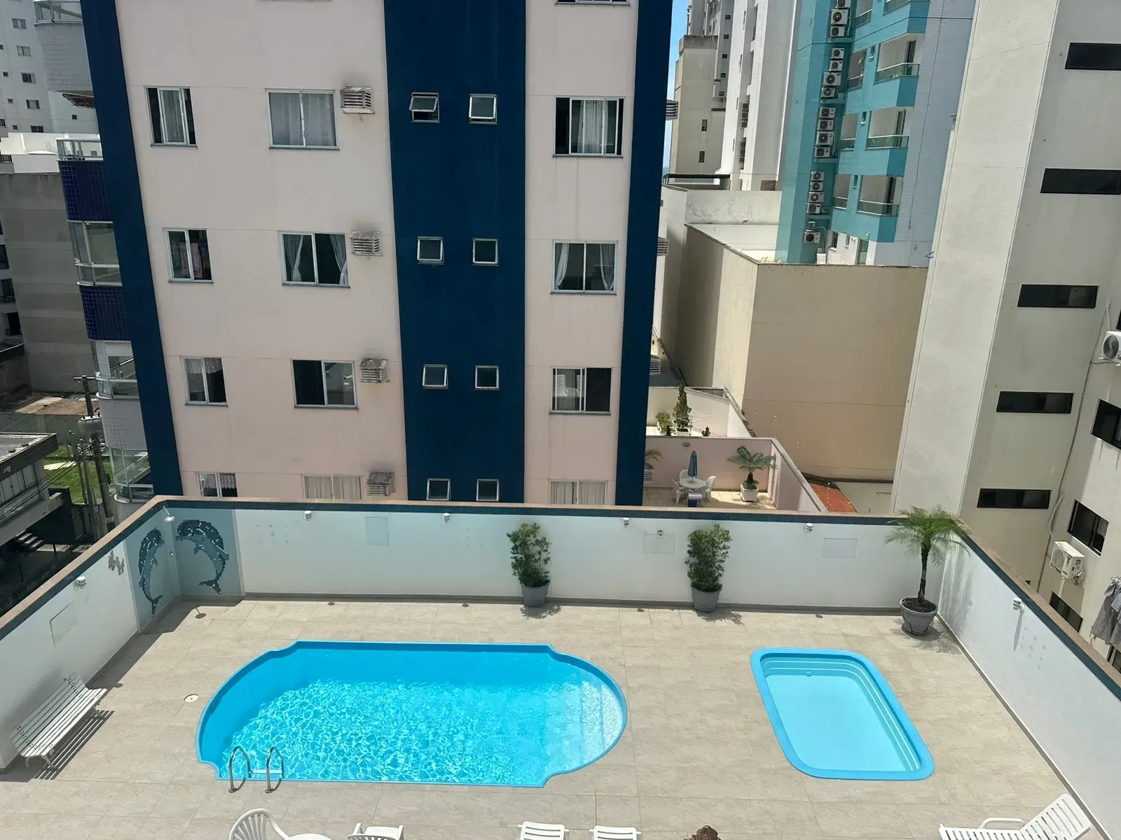 Apartamento com 139m², 3 dormitórios, 1 suíte, 2 vagas, no bairro Centro em Balneário Camboriú para Comprar