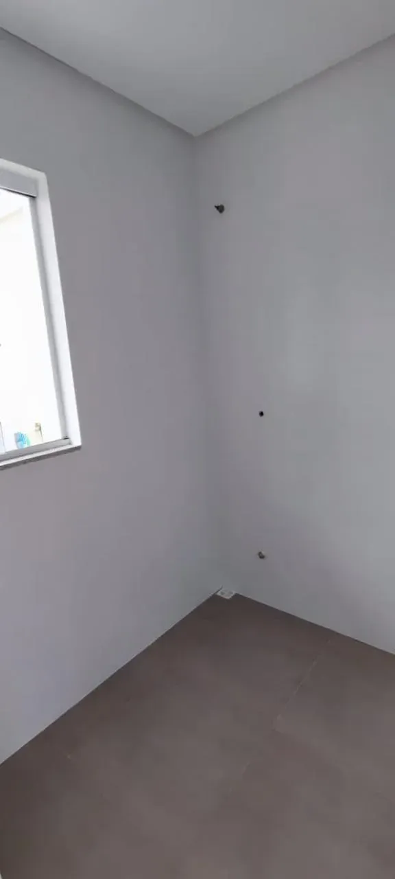 Casa com 2 Dormitórios sendo 1 suíte e 1 vaga na Garagem em Navegantes.