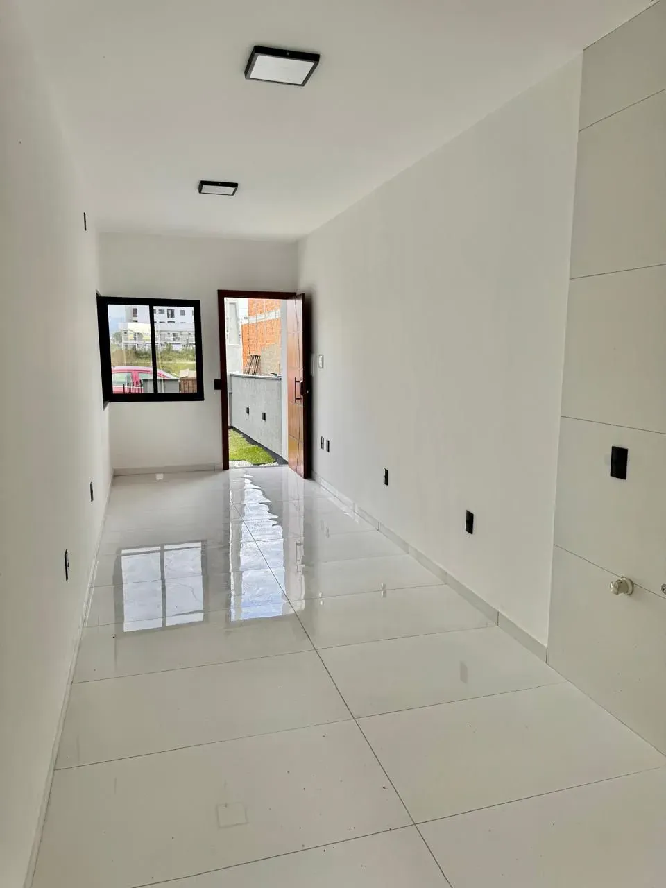 Casa geminada com 2 dormitórios e garagem para 2 carros em Palhoça/SC