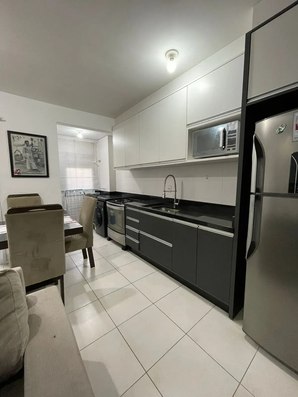 Apartamento 2 dormitórios e 1 vaga de garagem em Palhoça/SC