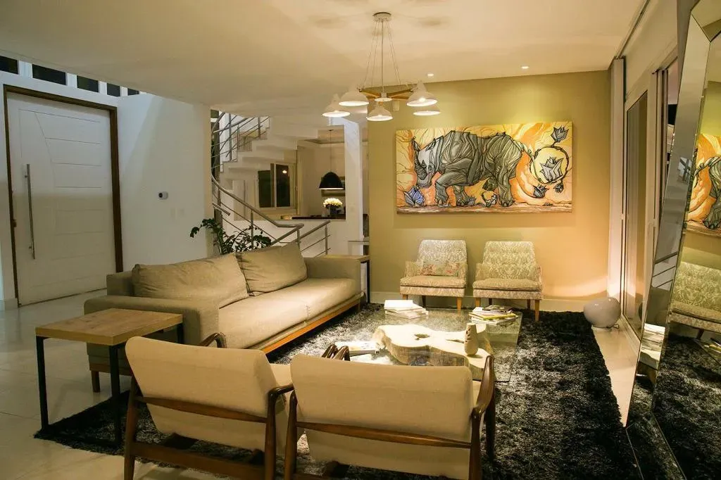 Casa com 5 dormitórios sendo 4 suítes e 6 vagas de garagem em Jurerê Internaciona l Florianópolis/SC