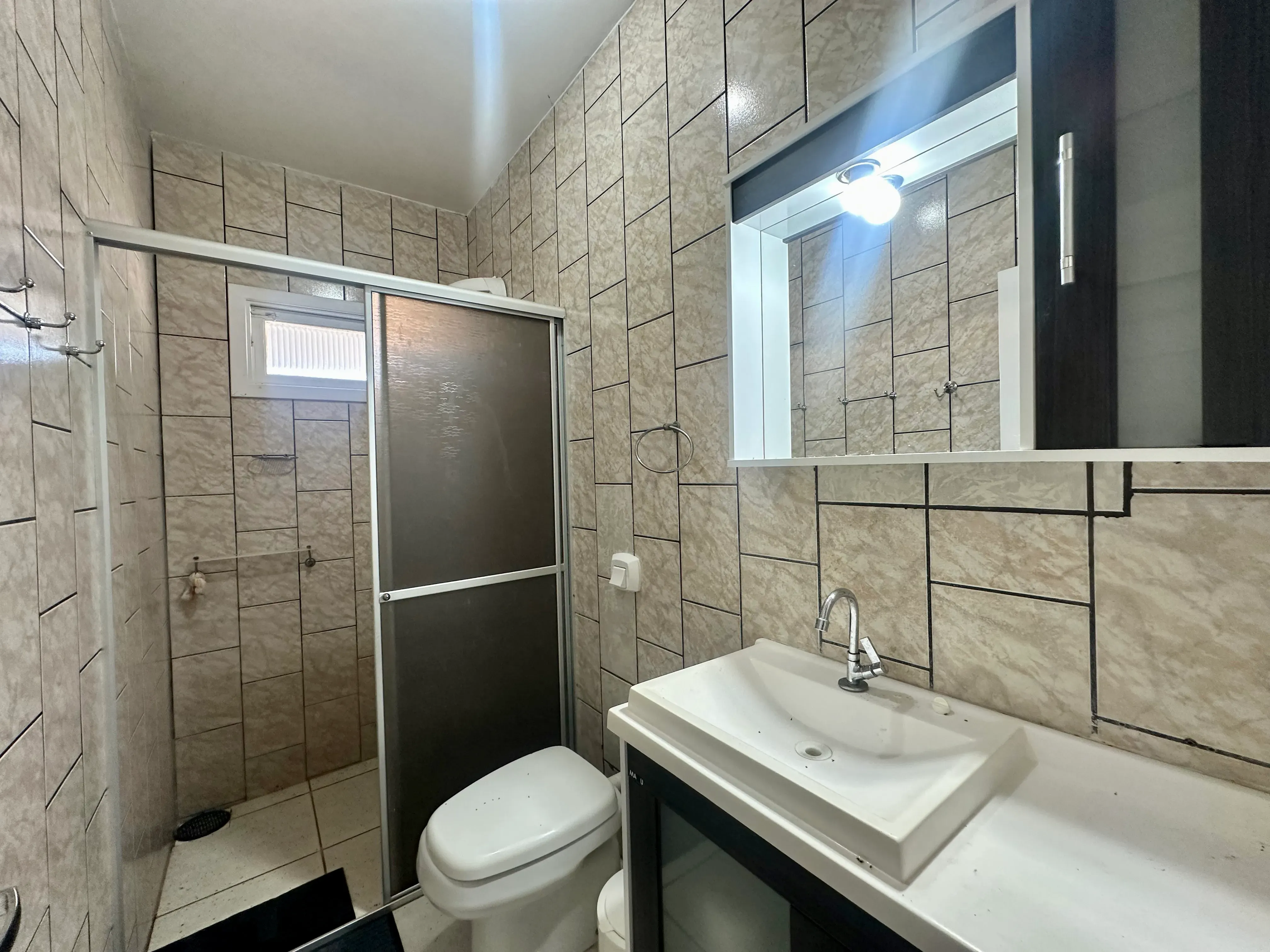 Casa com 3 dormitórios e 2 vagas, 850m da praia do Gravatá - Navegantes/SC