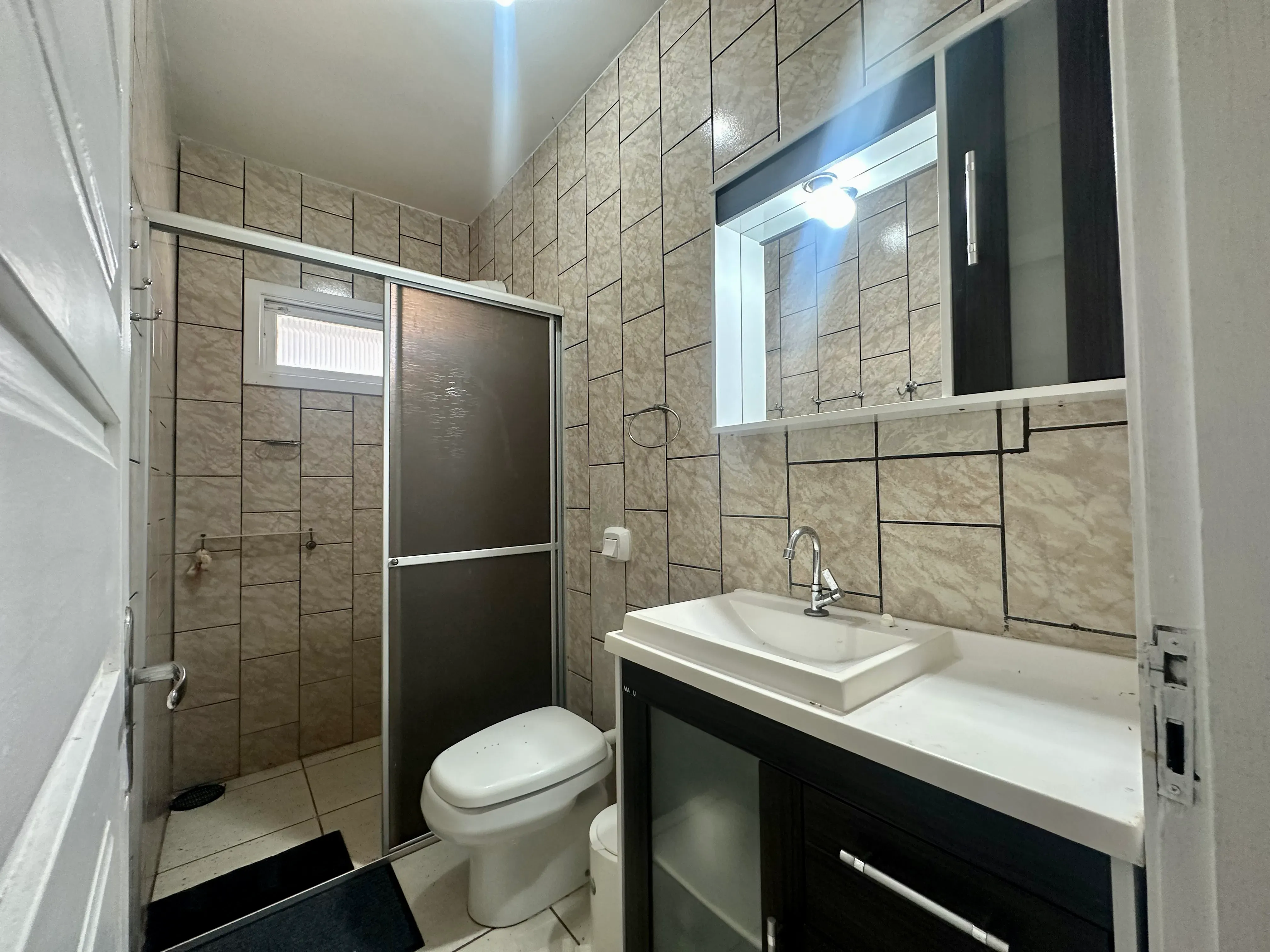 Casa com 3 dormitórios e 2 vagas, 850m da praia do Gravatá - Navegantes/SC