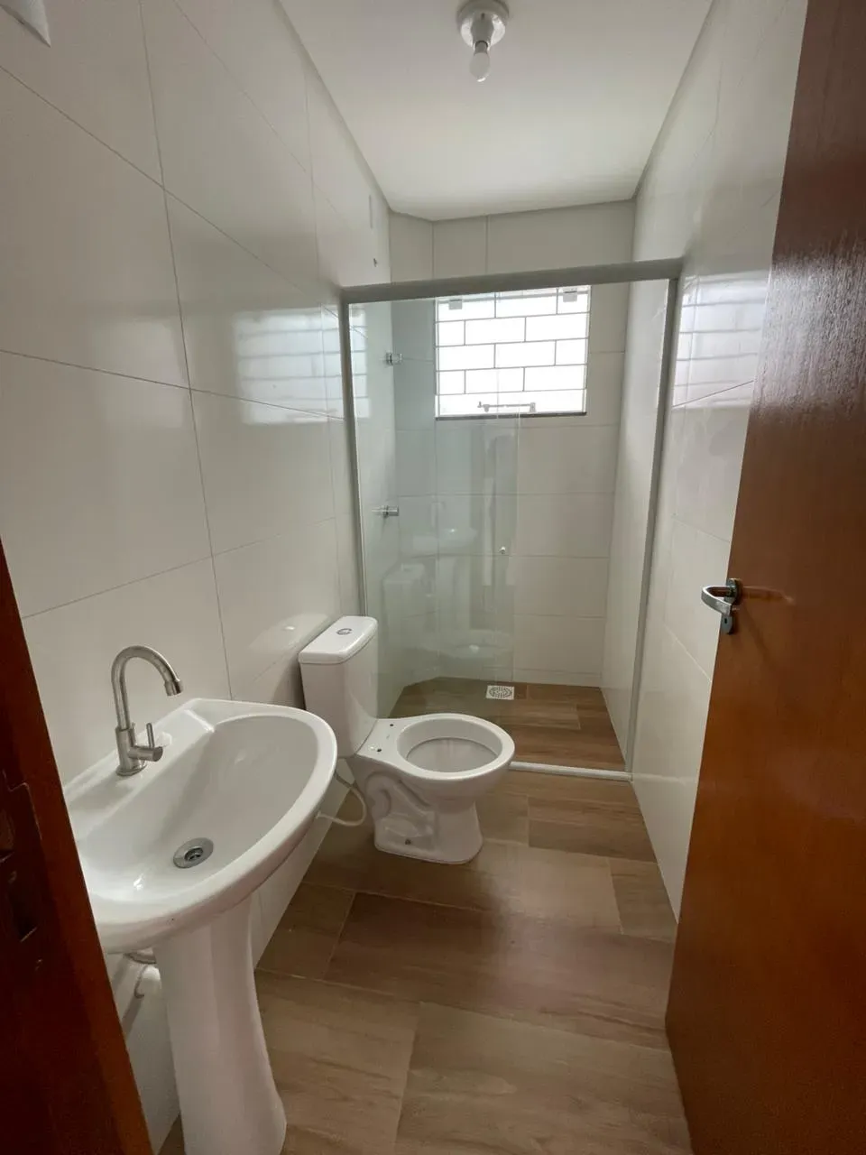 Apartamento com 2 dormitórios sendo 1 suíte e 1 vaga de garagem em Palhoça/SC