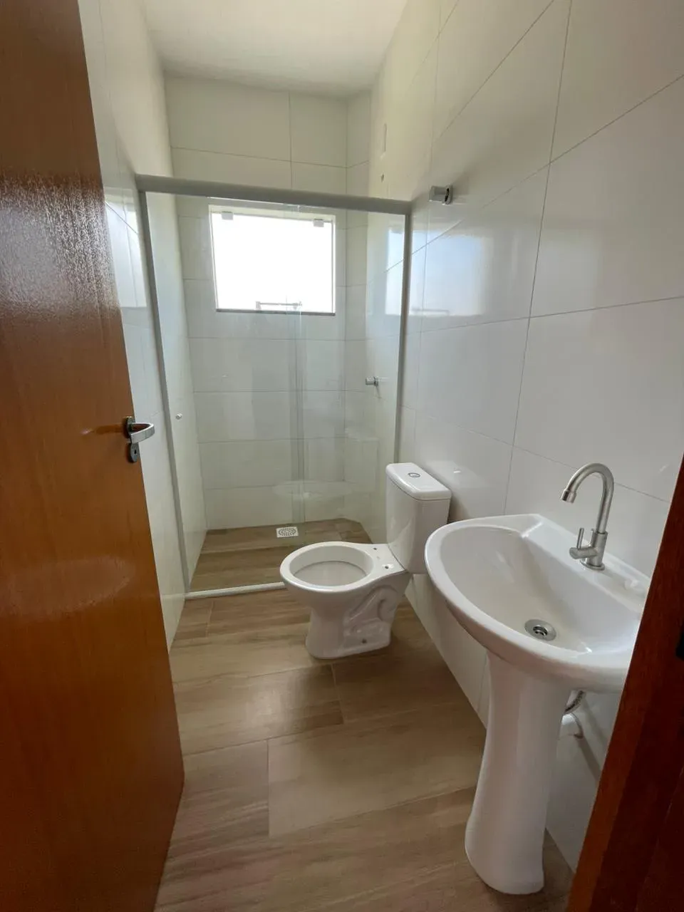 Apartamento com 2 dormitórios sendo 1 suíte e 1 vaga de garagem em Palhoça/SC