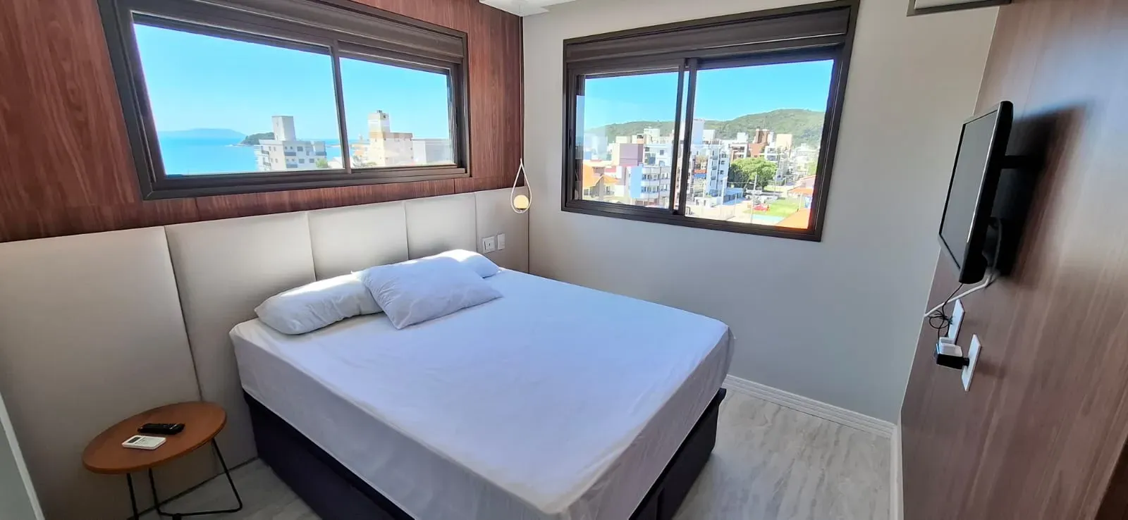 Apartamento com 4 dormitórios sendo 2 suítes e 2 vagas de garagem em Governador Celso Ramos/SC