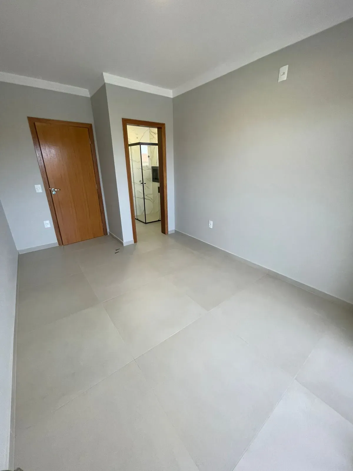 Casa com 2 dormitórios sendo 2 suítes e 2 vagas de garagem em Palhoça/SC