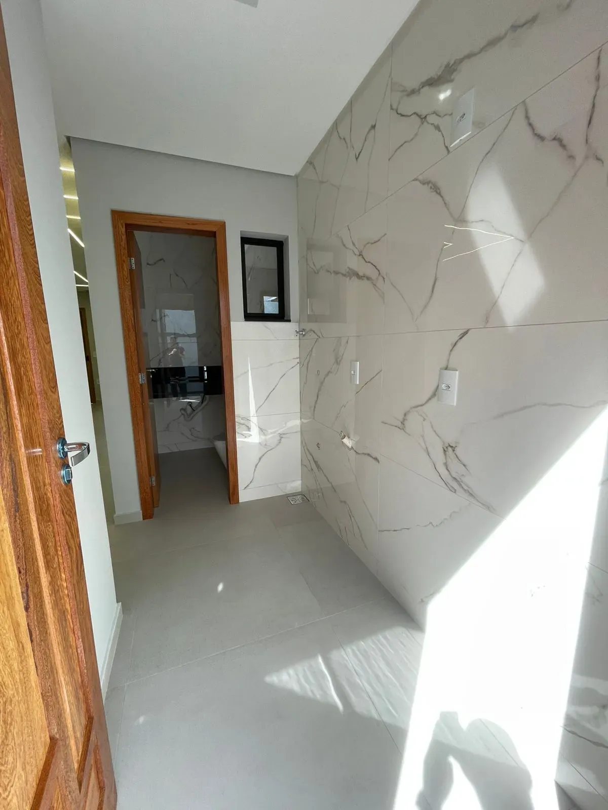 Casa com 2 dormitórios sendo 2 suítes e 2 vagas de garagem em Palhoça/SC