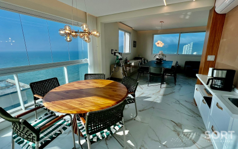 Living Apartamento Quadra Mar no Edifício Luar Biasa