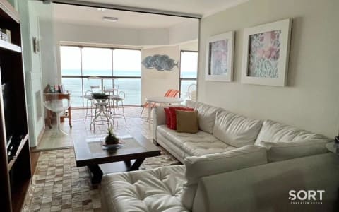 Living Apartamento Frente Mar no Edifício Cosmos Torre Halley