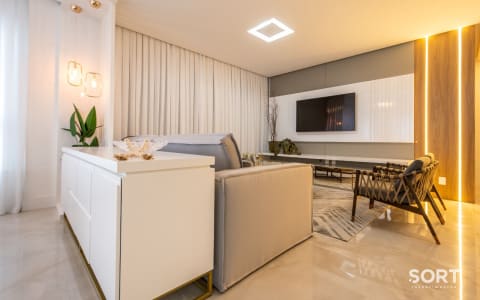 Sala de estar Apartamento Quadra Mar no Edifício Brescia