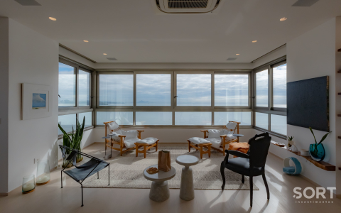 Sala de estar Apartamento no Apogee Cechinel Frente-Mar na Barra Sul
